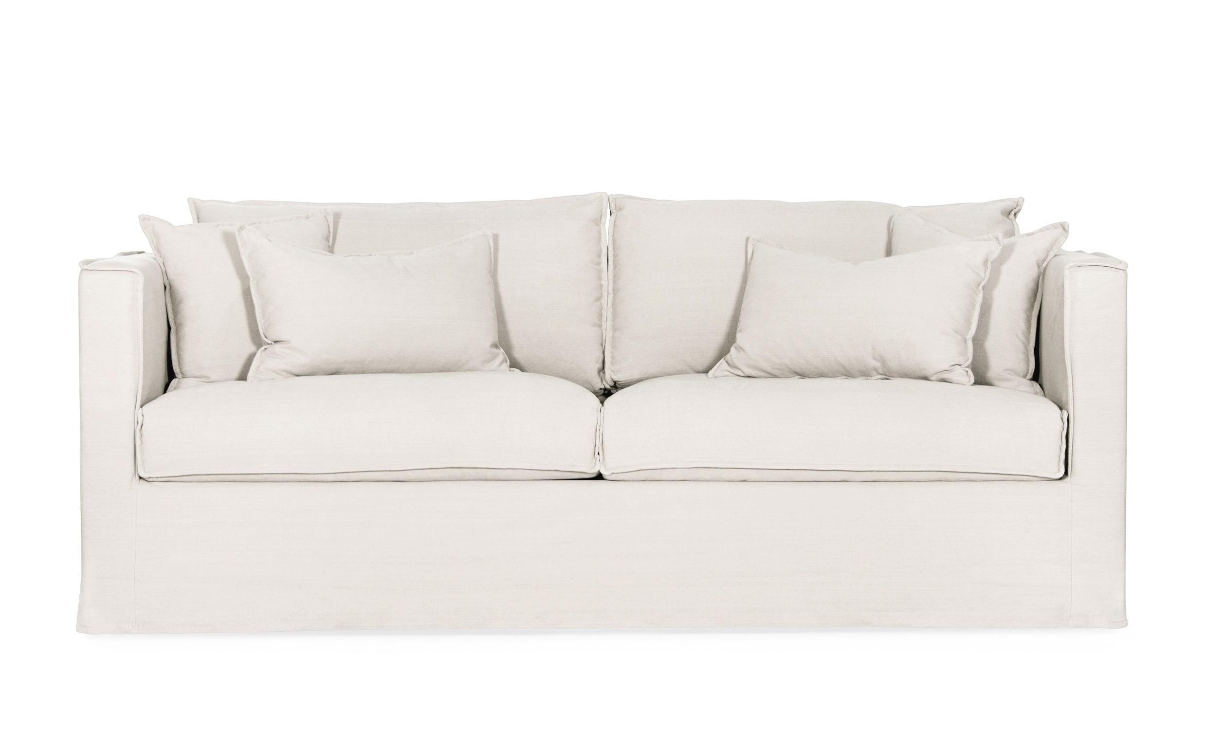 Beige tresitssoffa med hög sits och smala armstöd